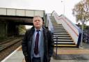 Mike Amesbury in front of the steps he says are an unnecessary obstacle for passengers with limited mobility