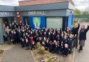 Pupils and staff at Over Hall  Community School  celebrating their most recent Ofsted grade