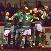 The Northwich Victoria players celebrate a goal against Whitchurch Alport