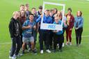 AMBASSADOR: Padraig Amond, Hartlepool United's Number 9, with young people from the town.