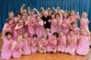 West End star Debbie Hilton and girls from Loreto Prep show off their most ferocious faces