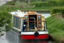 Man arrested on suspicion of murder after fight on canal barge