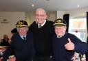 Ron McLaverty, left, and Roger Blake, right, proudly wearing their life members' caps with chairman Ken Jones. Picture: Ken Houghton