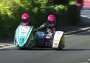 Rider Pete Founds and his passenger Jevan Walmsley during the 2023 Isle of Man TT sidecar race one