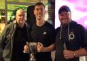 Greg Smith, centre, being presented with the Castle Classic Trophy by Adi Faulkner, competition organiser, right; and Tim Shaw, tournament sponsor from Northwich Carpets & Laminates, left