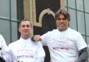 Rob Newton with John Bishop when the comedian helped launch the bakery's charity challenge.