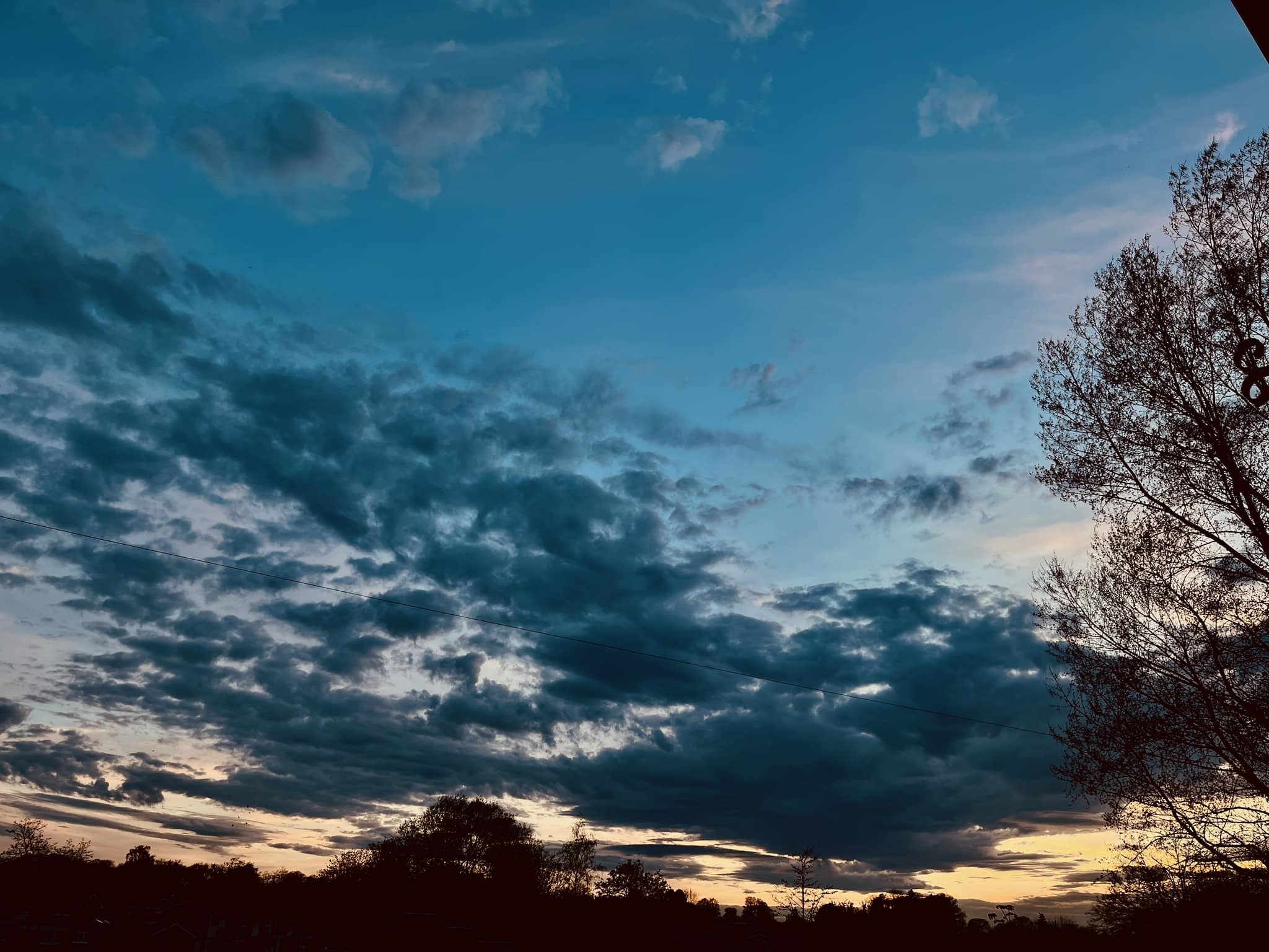 Storm clouds at sunset over Knutsford by Carly Jo Curbishley