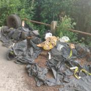Residents had to move the bags themselves to stop them polluting a local watercourse