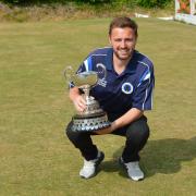 Castle Sports' Andy Hamann with the Cheshire Merit trophy