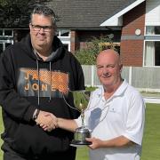 Glynn Cookson receives the D&D Coatings Mid Cheshire Merit Trophy from Paul Drinkwater, managing director of D&D Coatings