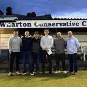 Greg Smith receives the Wharton Cons winner's prize from the competition organisers. From left, Owen Cookson, Danny Nixon, Tom Vickers, Greg Smith, Phil Cookson, Simon Cookson
