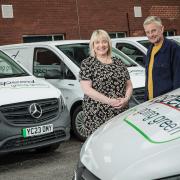 Topspeed Couriers' directors Gillian Lockley and Stephen Clegg with some of their Mercedes-Benz eVito vans