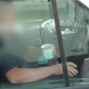 A tea-sipping trucker was caught by undercover police on the M6