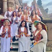 Lalita Sivakumar (front, centre) has been running her Bollywood dance school in Northwich for eight years