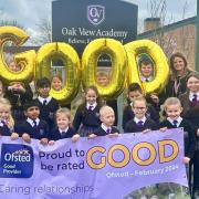 Staff and puils at Oak View Academy in Winsford celebrating their most recent Ofsted result