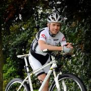 Giles Bett with his mountain bike