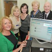Demonstrating the new Kaonix job search system are (from left) Debbie Cragg and Alison Reid, area learning co-ordinators for CWAC; Helen Neal, specialist librarian for CWAC; Christine Gould, customer employability advisor and mentor for Weaver Vale