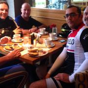 Vélo Club Grange cyclists enjoy an obligatory cafe stop on their last outing. Pictured, from left, are Matt Jump, Simon Howells, Derek Heine, Alex Masters and Howard Kelly.