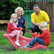 Gill Targett, from Moulton Pre-school, and David Wakefield, with Grace Entwisle and Ryan Potter, both four.