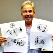 David Yearsley with some of Bill Tidy's illustration's for his book Winding the Clock Back.