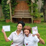 Sarah Elliwell and Melissa Coombs competed a parachute jump to raise money for The Barns.