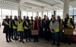 Cheshire Food Hub and Changing Lives Together volunteers at the project's Barons Quay distribution centre