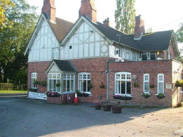Verdin Arms (former Plough Inn), Wimboldsley. Closed in 2014 and sold by owner Robinsons