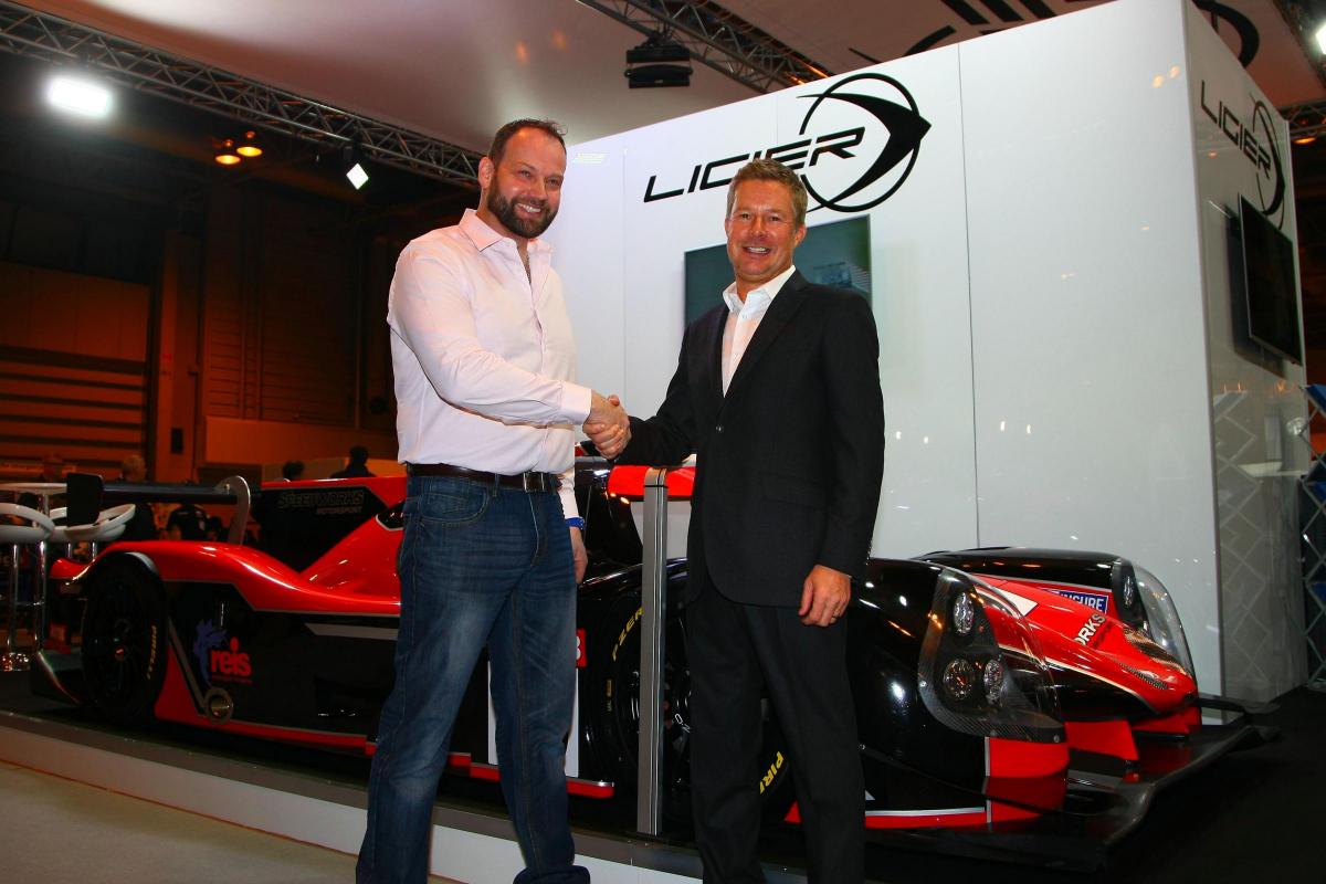 Team principal Christian Dick shakes hands with Richard Dean, of United Autosports, as Speedworks Motorsport unveil their latest addition - a Ligier JS P3 LMP3 class prototype - during the 2017 Autosport International Show. Picture: Matt Sayle Photography