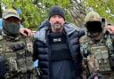 Steven Holland with Ukrainian soldiers