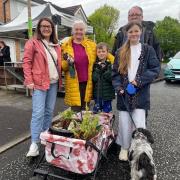 The Mottershaw and Dawson family filled a garden trolley with plants