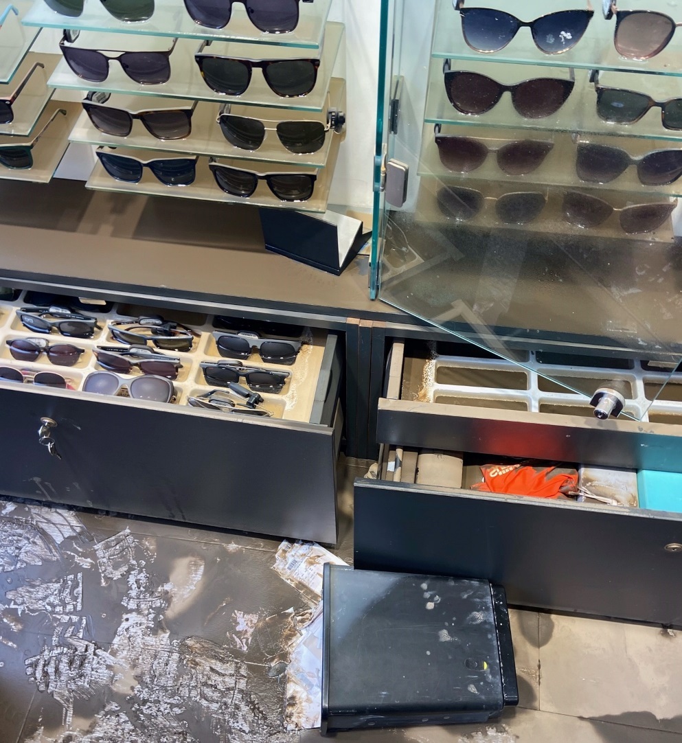 Drawers of display cases full of glasses were destroyed