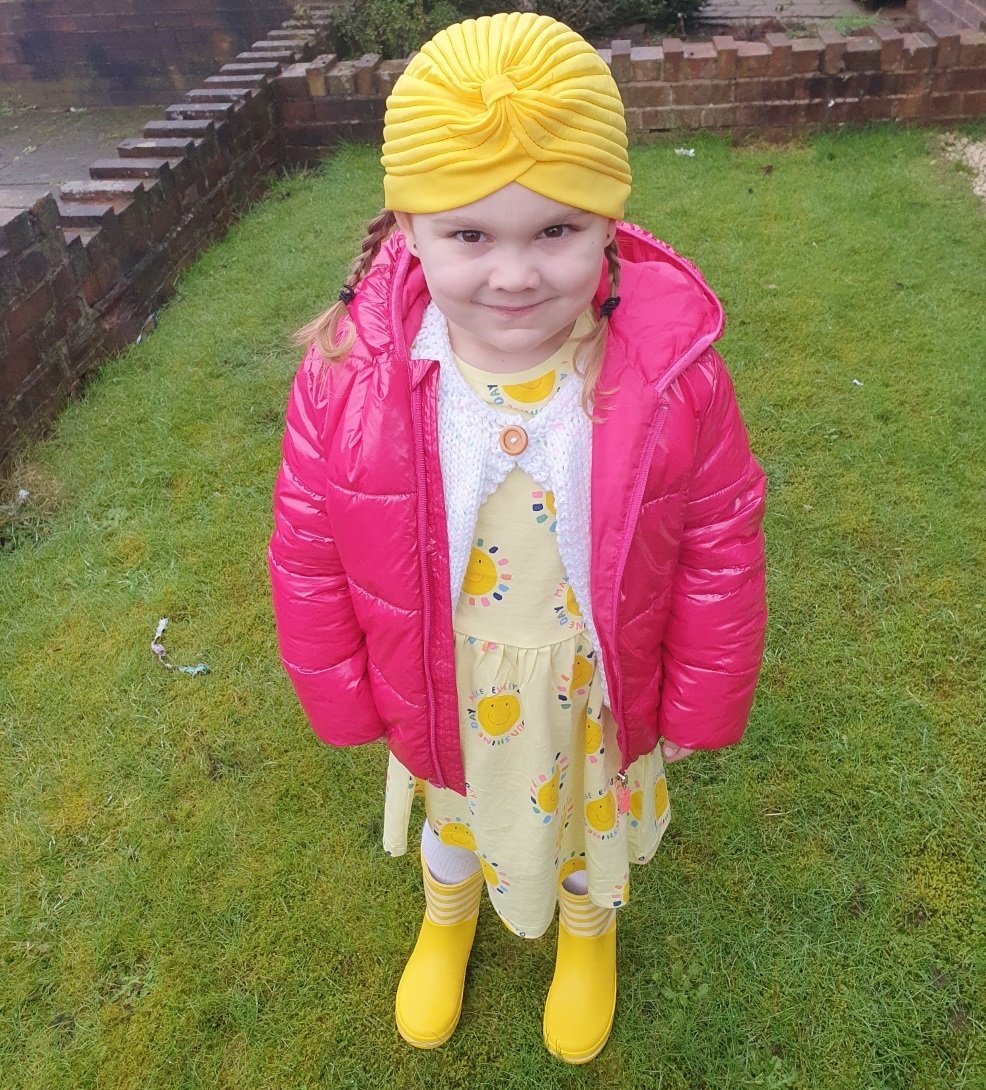Sophia always wears something yellow for her walks