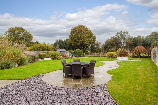 A large garden provides plenty of space to entertain