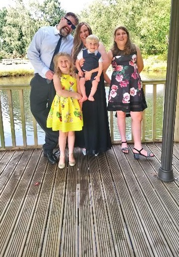 Wayne with wife Jo and children Lucas, three, Nicole, 10 and Ellie, 13