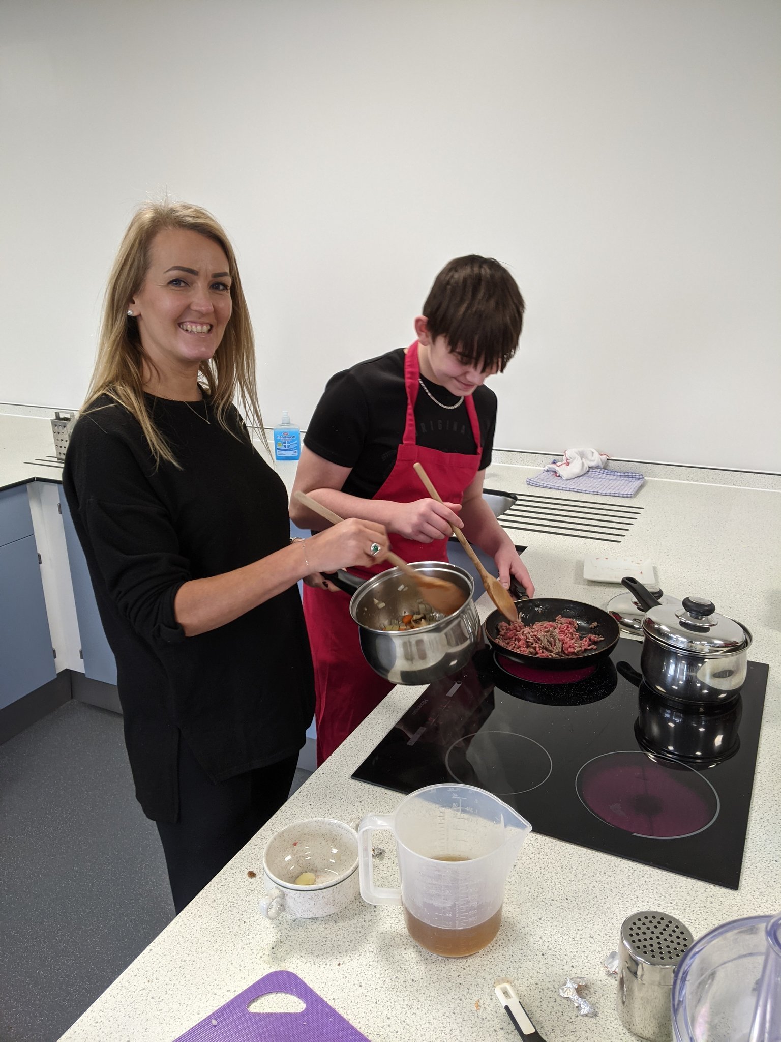 Students learn how to make pies in cookery classes