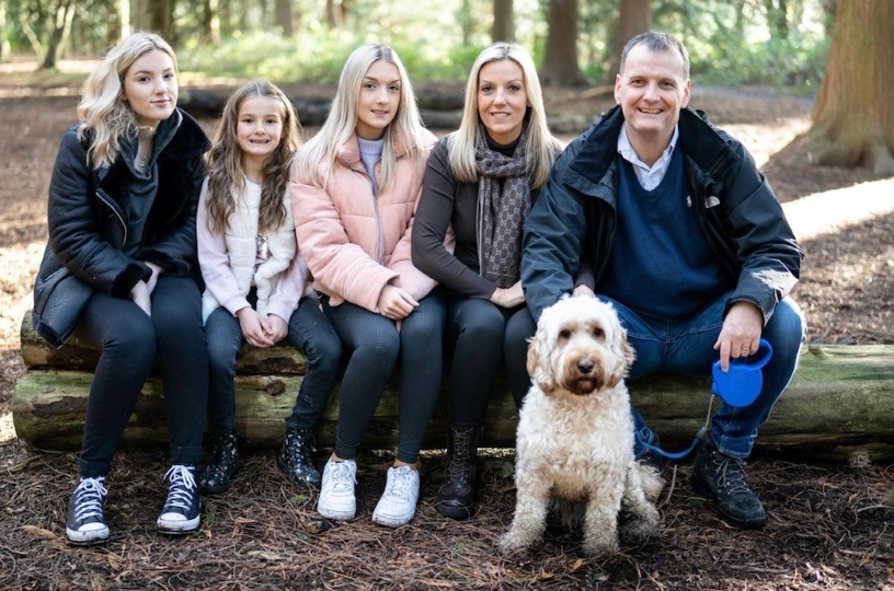 Charley with sisters, from left, Lucy, Olivia, mum Joy, dad Nick and Cockapoo Bobbie