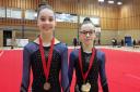 Twins Agnes and Edie Coyle, 12, won medals at the same event
