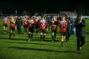 Jon Macken, right, leading his Witton Albion players off the field at Glossop North End on Saturday. Picture: Karl Brooks Photography