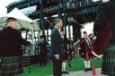 The then Prince of Wales' arrival was heralded by the South Cheshire Pipe Band