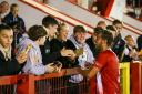 Oliver Hitchcox celebrates with Witton Albion fans on Tuesday night. Picture: Karl Brooks Photography