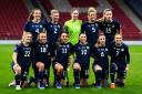 Sandy MacIver - back row, third from left - lines up with her Scotland teammates ahead of her debut against the Netherlands