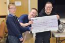 The Mid Cheshire Bowling League cheque being received on behalf of Down Syndrome Cheshire