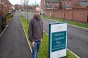Resident David Simcox at the entrance to Coppenhall Place Estate which is built on the site of the former Crewe Works
