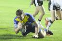 Max Wood, seen here scoring against Widnes Vikings during pre-season, could make his Super League debut for Warrington Wolves against Hull FC