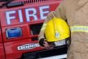 Firefighters spend hours tackling house fire and remain on scene overnight