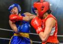 Mae Astbury makes a punch count during her amateur career