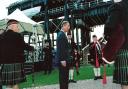 The then Prince of Wales' arrival was heralded by the South Cheshire Pipe Band