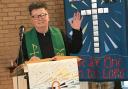 Rev Alma Fritchely as Castle Community Church hosted its first service in over a year