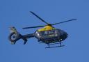 The police helicopter was spotted patrolling the tracks between Cuddington and Greenbank stations