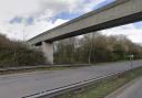 Rocks were thrown at the police vehicle from the pedestrian footbridge over the A54